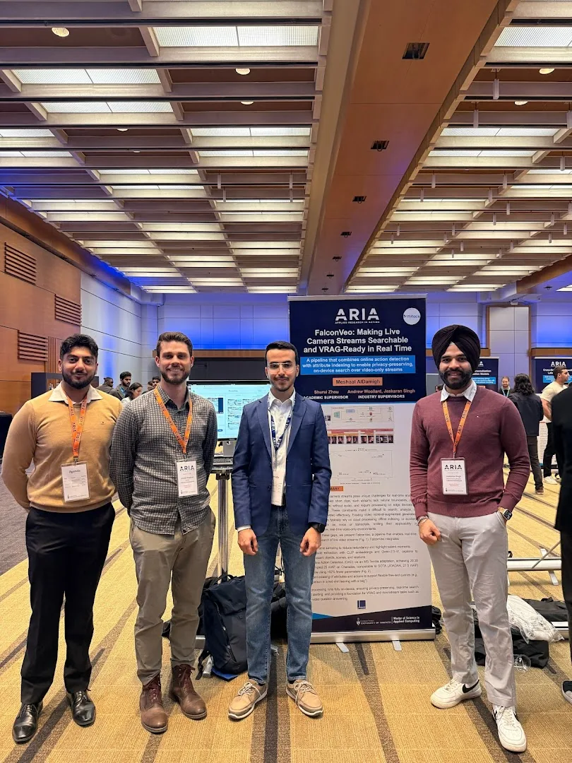 Jaskaran speaking with attendees at a conference
